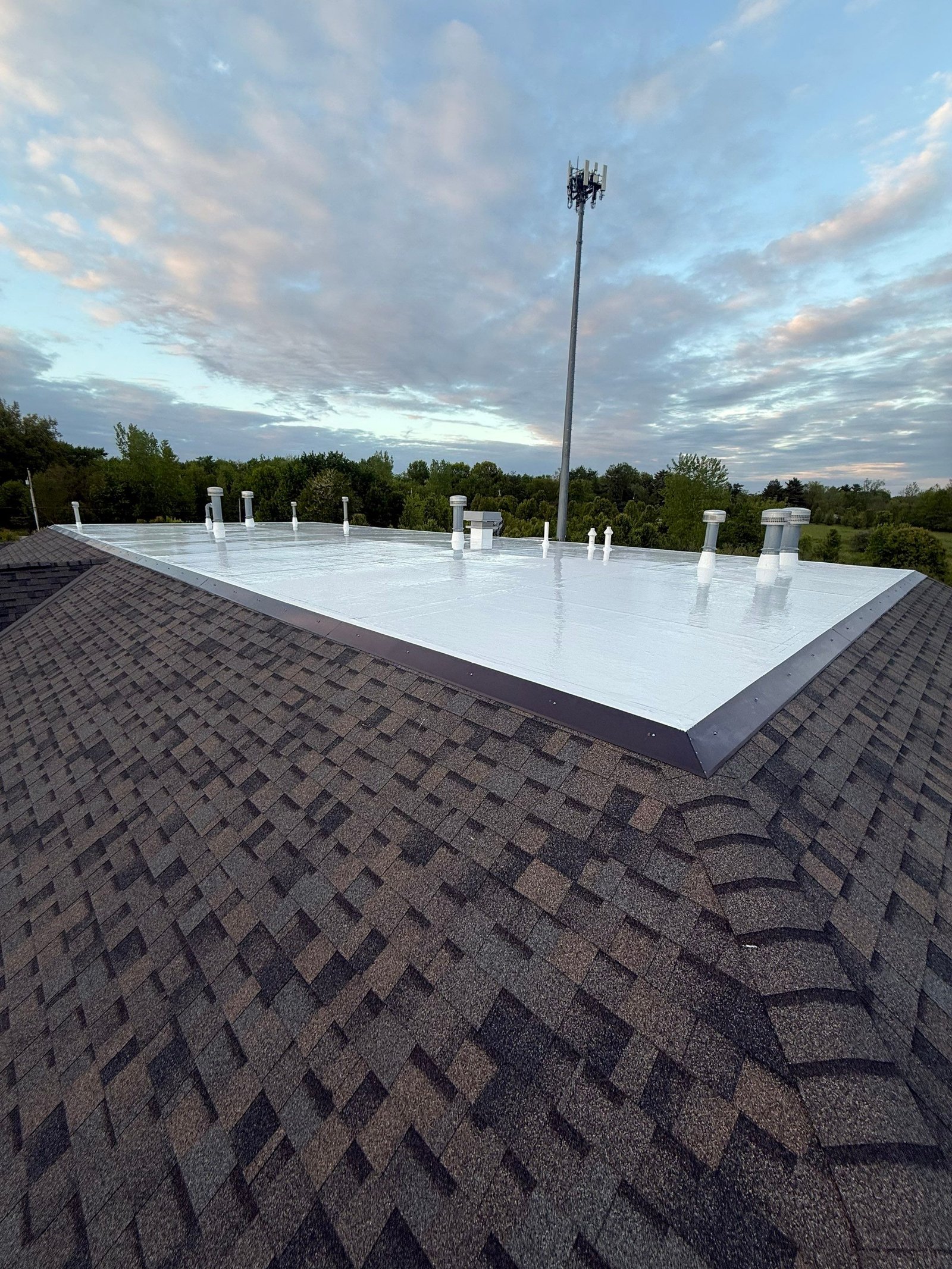 Finished white flat roof restoration results