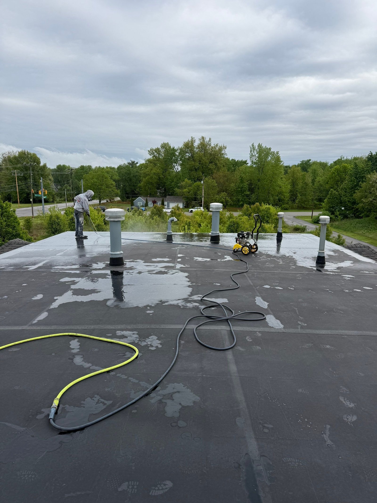 Condition of commercial flat roof before restoration
